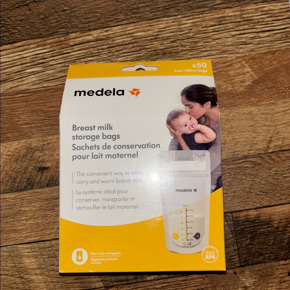 Medela Breast Milk Storage Bags in White and Orange Packaging
